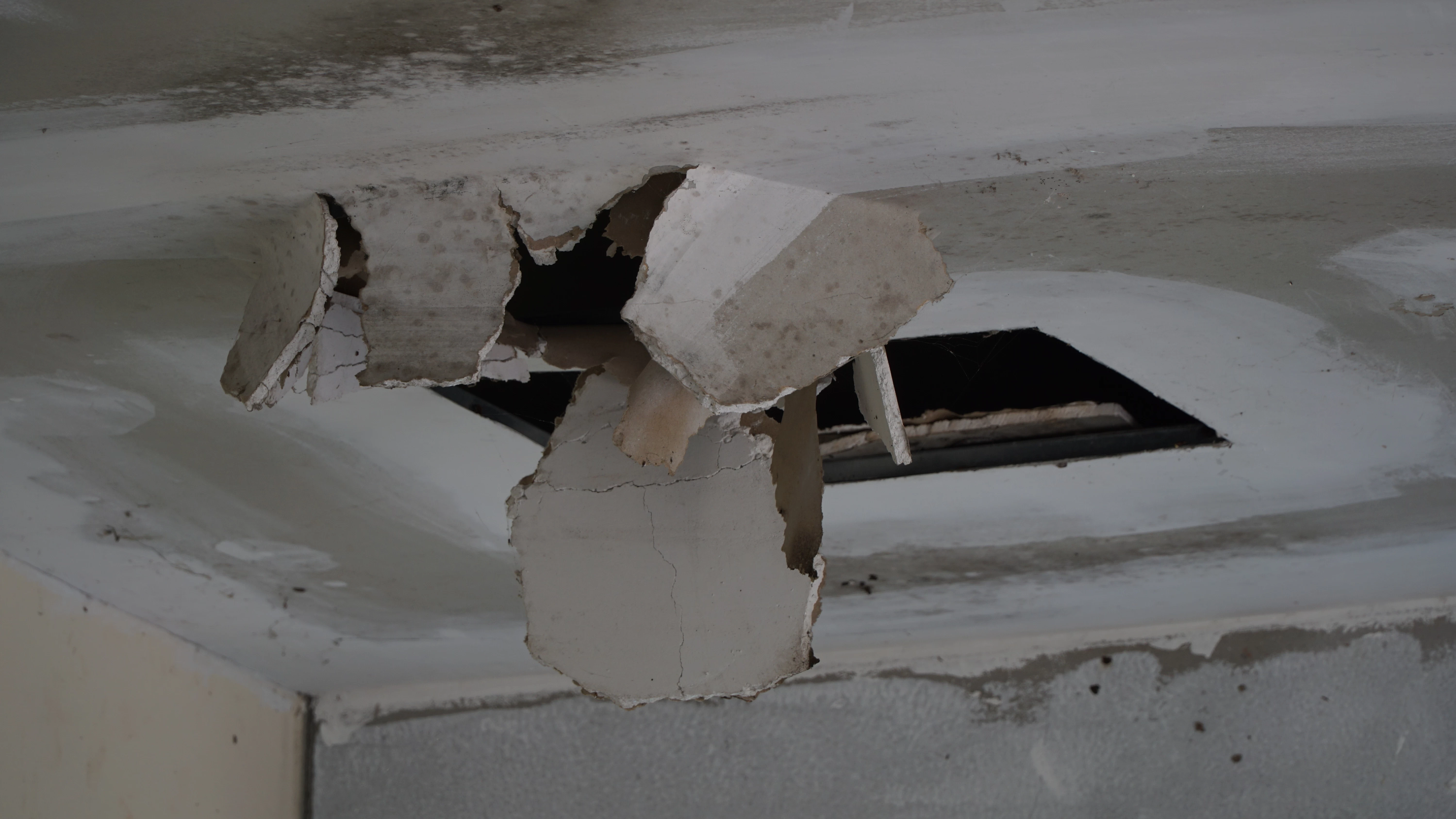 image of the damaged ceiling due to a roof leak
