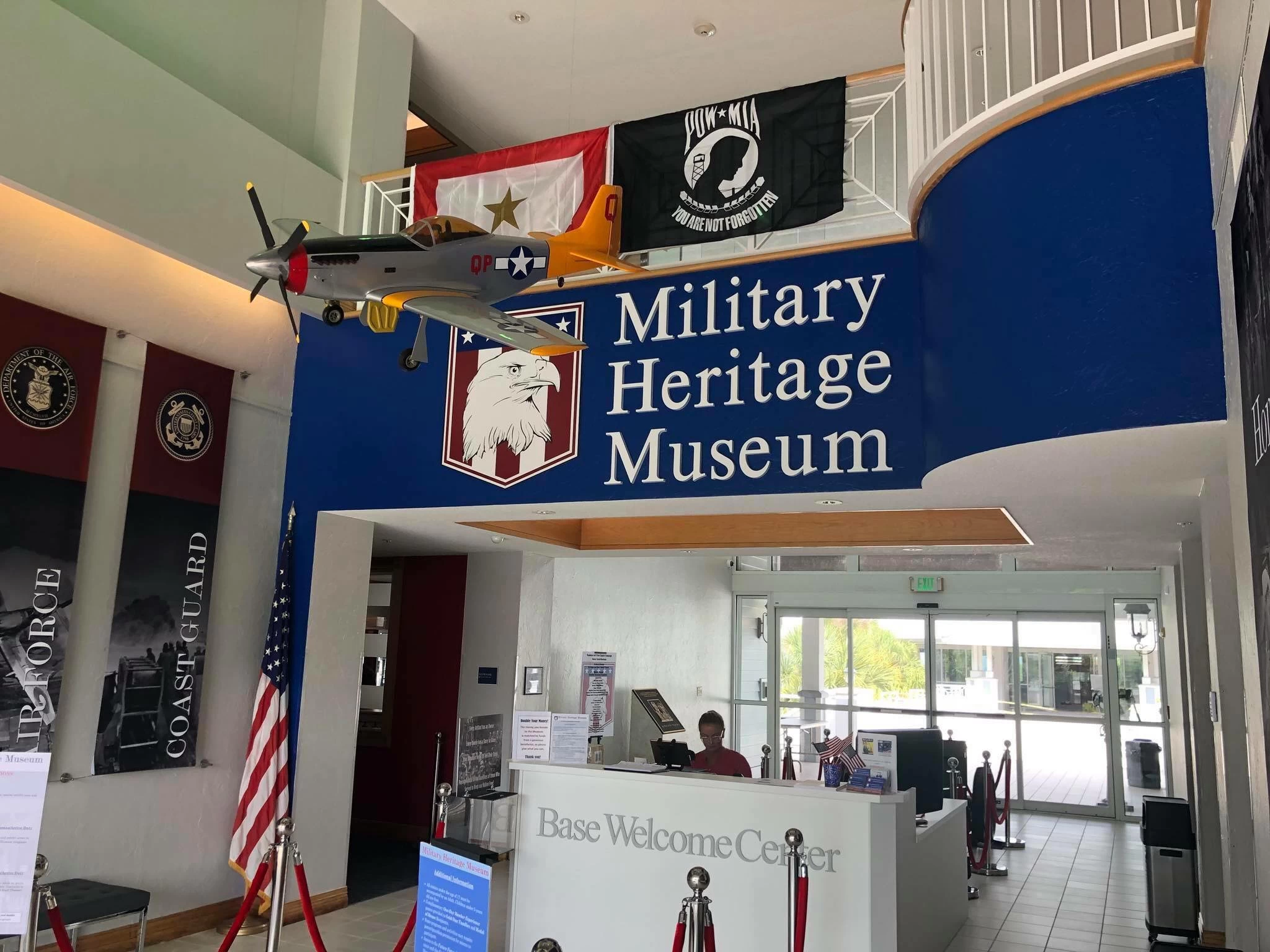Flags and banners hang at the entrance to the Military Heritage Museum in Southwest Florida