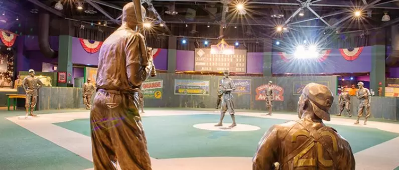 Bronze batter and catcher statues in an exhibit at the Negro League Museum in Kansas City, MO
