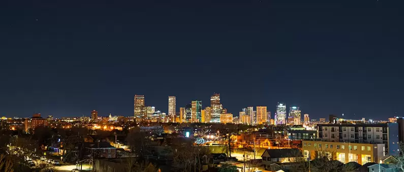 An incredible nighttime view of the Denver skyline from South Denver