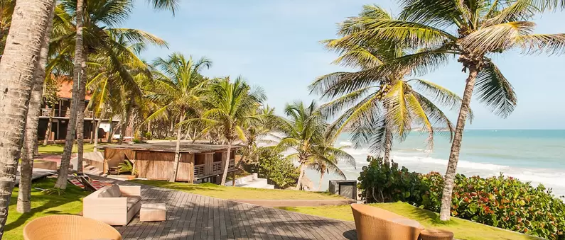 Palm trees and bungalows at a beachfront resort in Northeast Florida