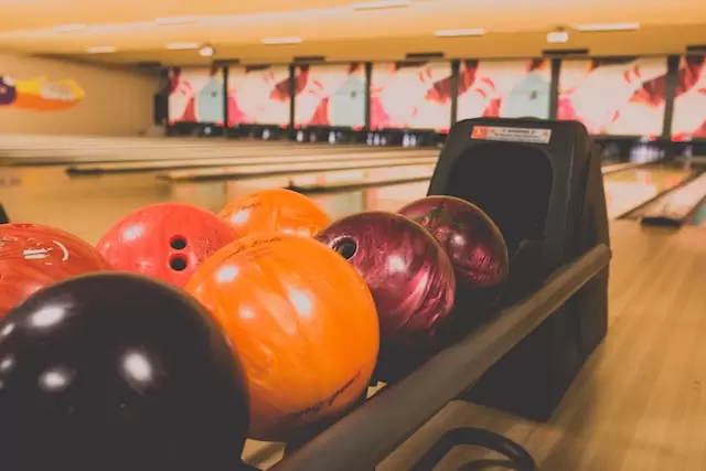 image of bowling balls and kegels at the Cowtown bowling center