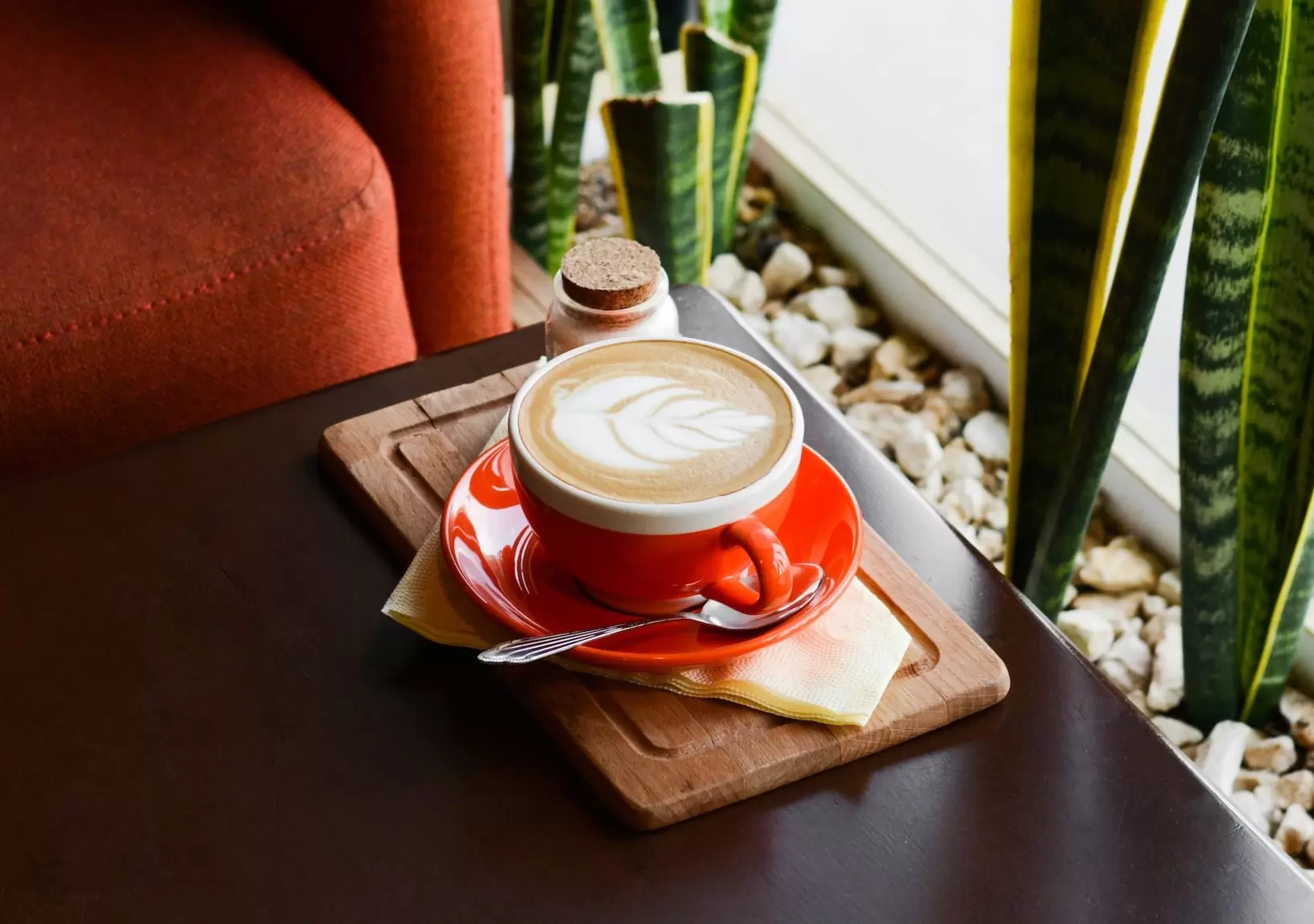 coffee in a red mug at Cumming coffee shop